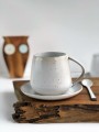 Kubek ceramiczny ze spodkiem w stylu boho