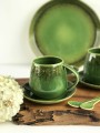 zielona filiżanka ceramiczna ze spodkiem