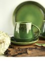 zielona filiżanka ceramiczna ze spodkiem